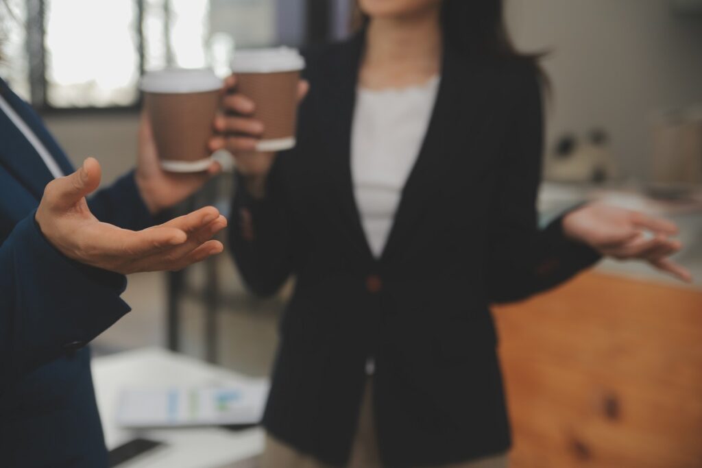 Young professionals networking to find entry-level jobs without experience in competitive markets