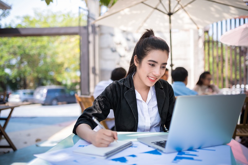 International student working multiple jobs - campus library, tech internship, and food service